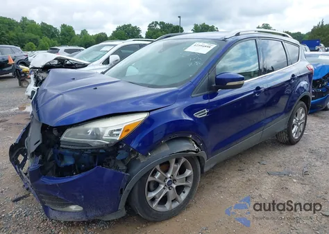 2014 Ford Escape Titanium z USA, uszkodzony, nr VIN 1FMCU0JX6EUD36700